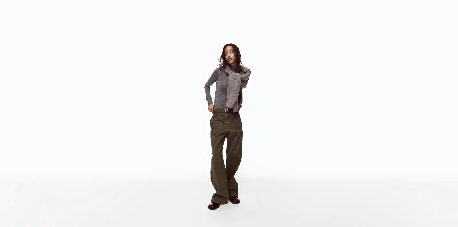 Image may contain Jasmine Tookes Clothing Pants Coat Jacket Formal Wear Suit Vest Person Knitwear and Sweater