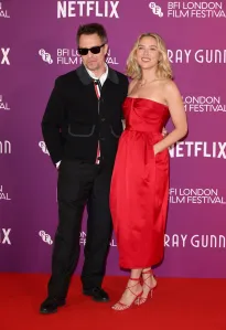 LONDON, ENGLAND - OCTOBER 10: Sam Rockwell and Scarlett Johansson attend the 