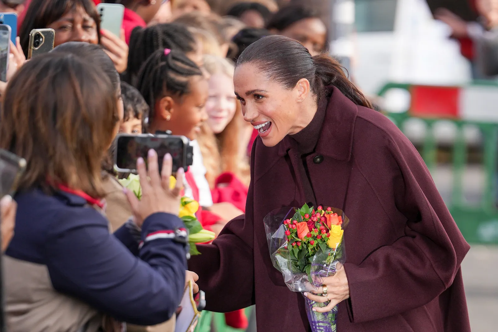 Image may contain Meghan Duchess of Sussex Flower Flower Arrangement Flower Bouquet Plant Head Person and Face