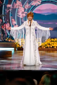 NASHVILLE, TENNESSEE - OCTOBER 21: EDITORIAL USE ONLY Reba McEntire performs onstage as CMA Presents I Will Always Love You: A Celebration Of Dolly Parton at The Fisher Center for the Performing Arts on October 21, 2026 in Nashville, Tennessee. (Photo by Jason Kempin/Getty Images)