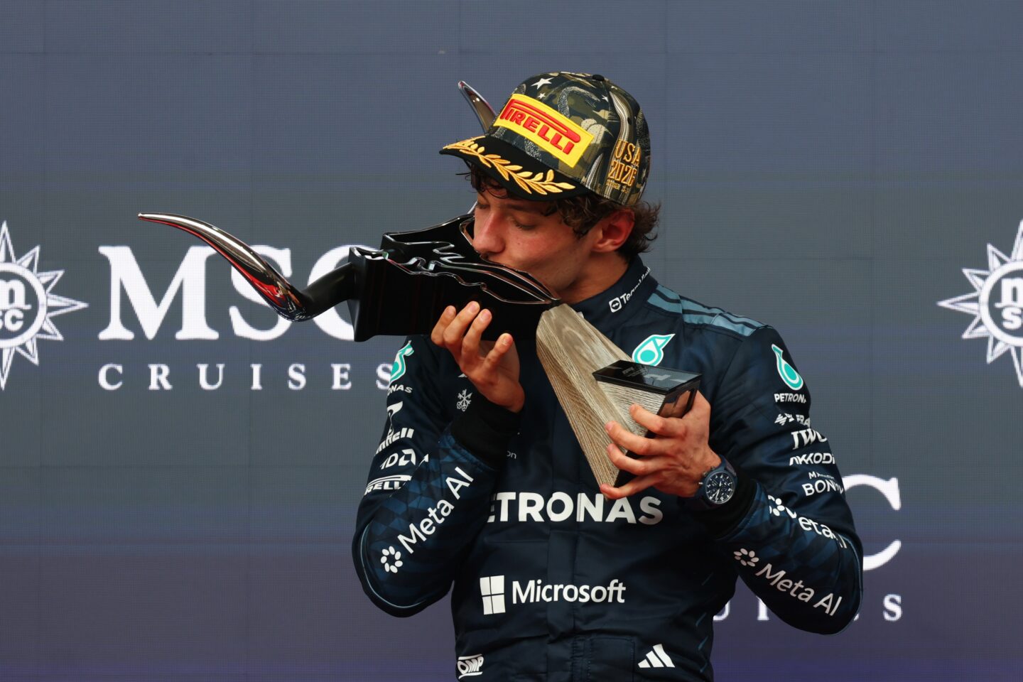 AUSTIN, TEXAS - OCTOBER 25: Race winner Andrea Kimi Antonelli of Italy and Mercedes AMG Petronas F1 Team celebrates on the podium during the F1 Grand Prix of United States at Circuit of The Americas on October 25, 2026 in Austin, Texas. (Photo by Clive Rose/Getty Images)
