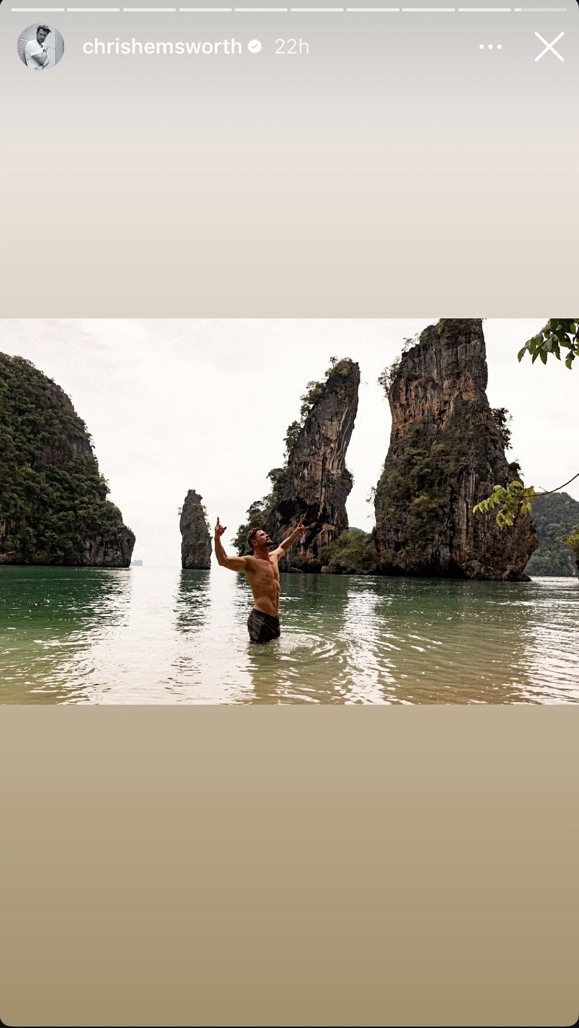 Chris Hemsworth posing shirtless in a tropical location from his IG Story.