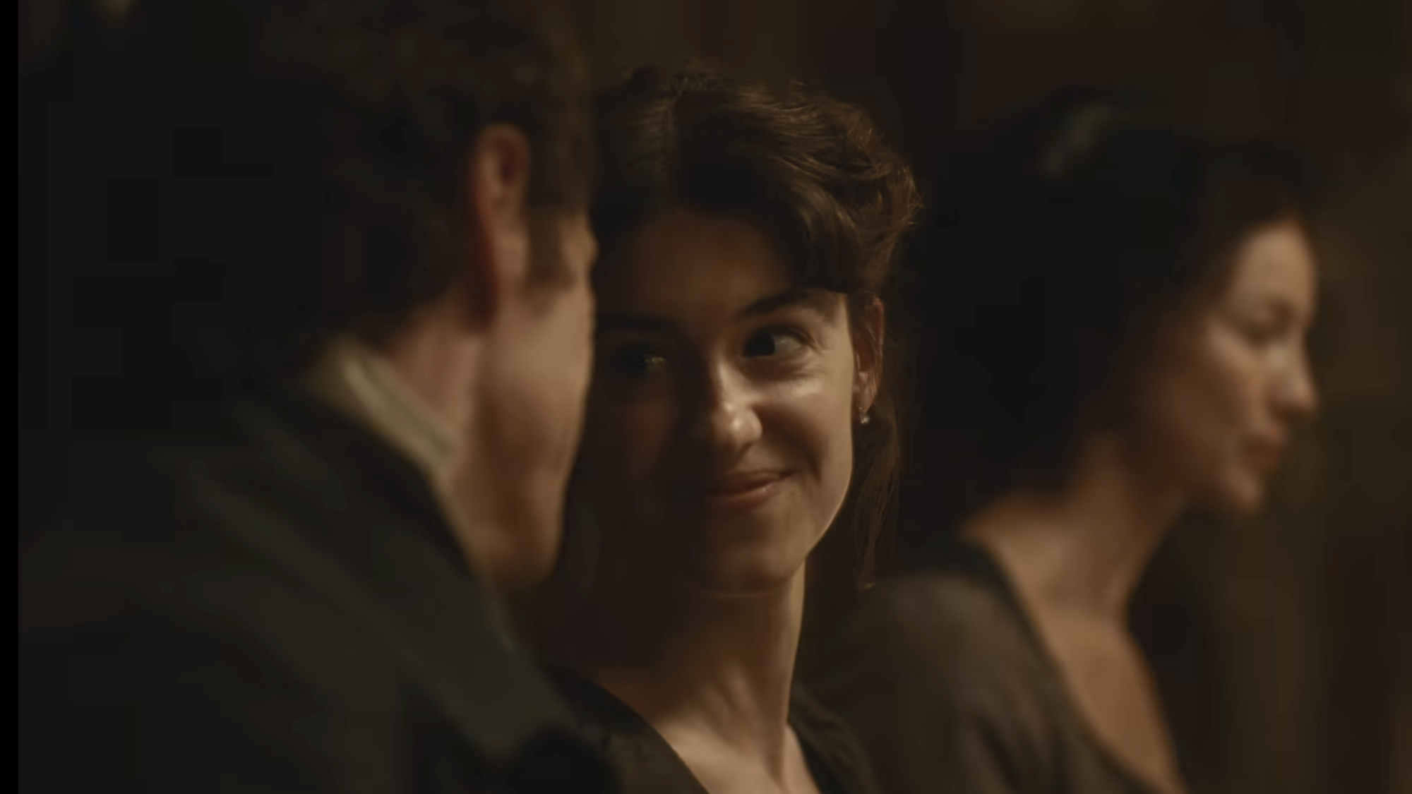 Daisy Edgar-Jones as Elena smiling at Edward in Sense & Sensibility