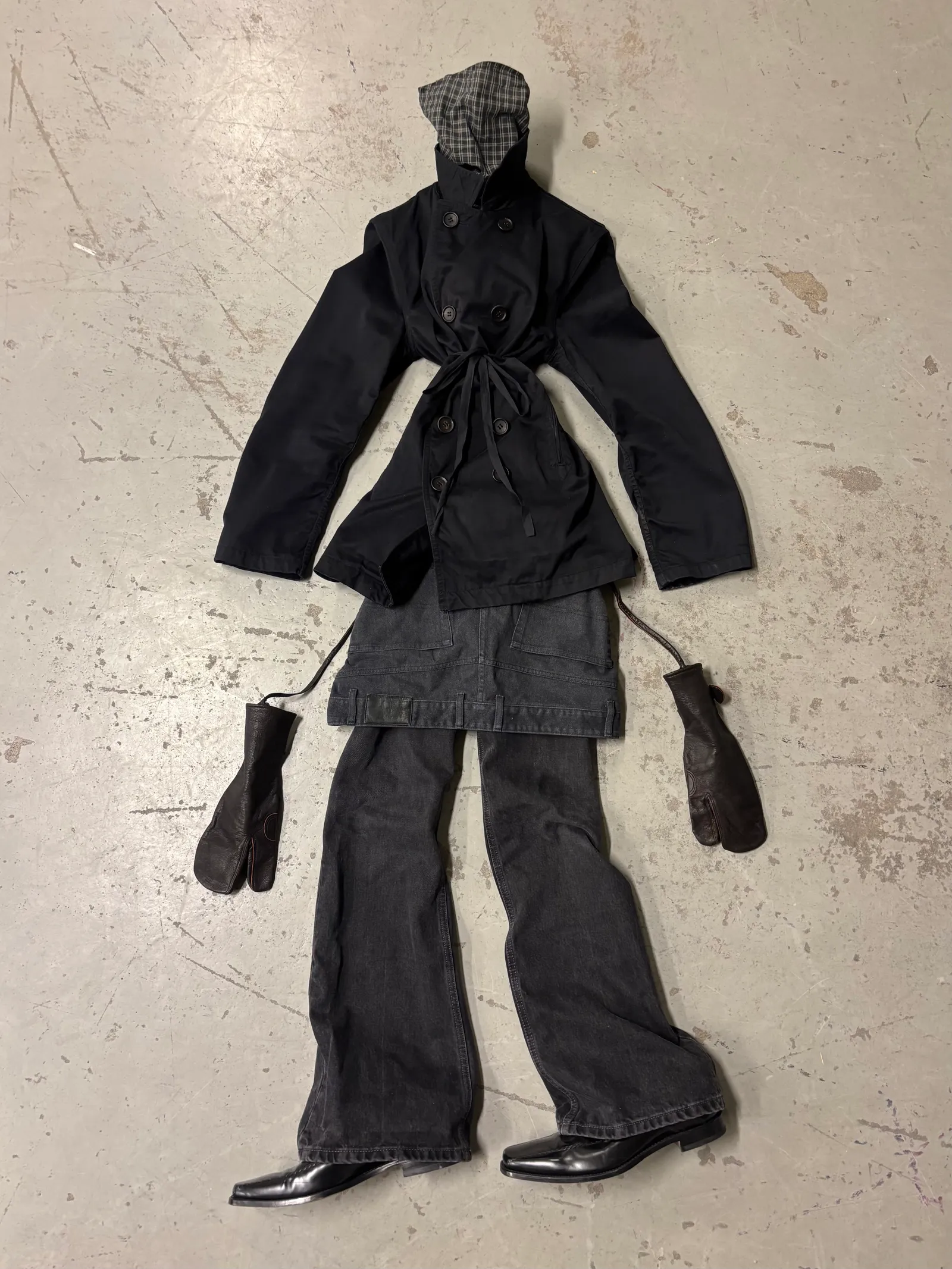 Image may contain Clothing Coat Adult and Person