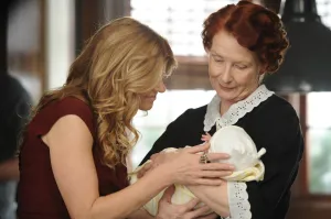 AMERICAN HORROR STORY: MURDER HOUSE, l-r: Connie Britton, Frances Conroy in 'Afterbirth' (Season 1, Episode 12, aired December 21, 2011), 2011-, ph: Prashant Gupta/©FX Networks/courtesy Everett Collection