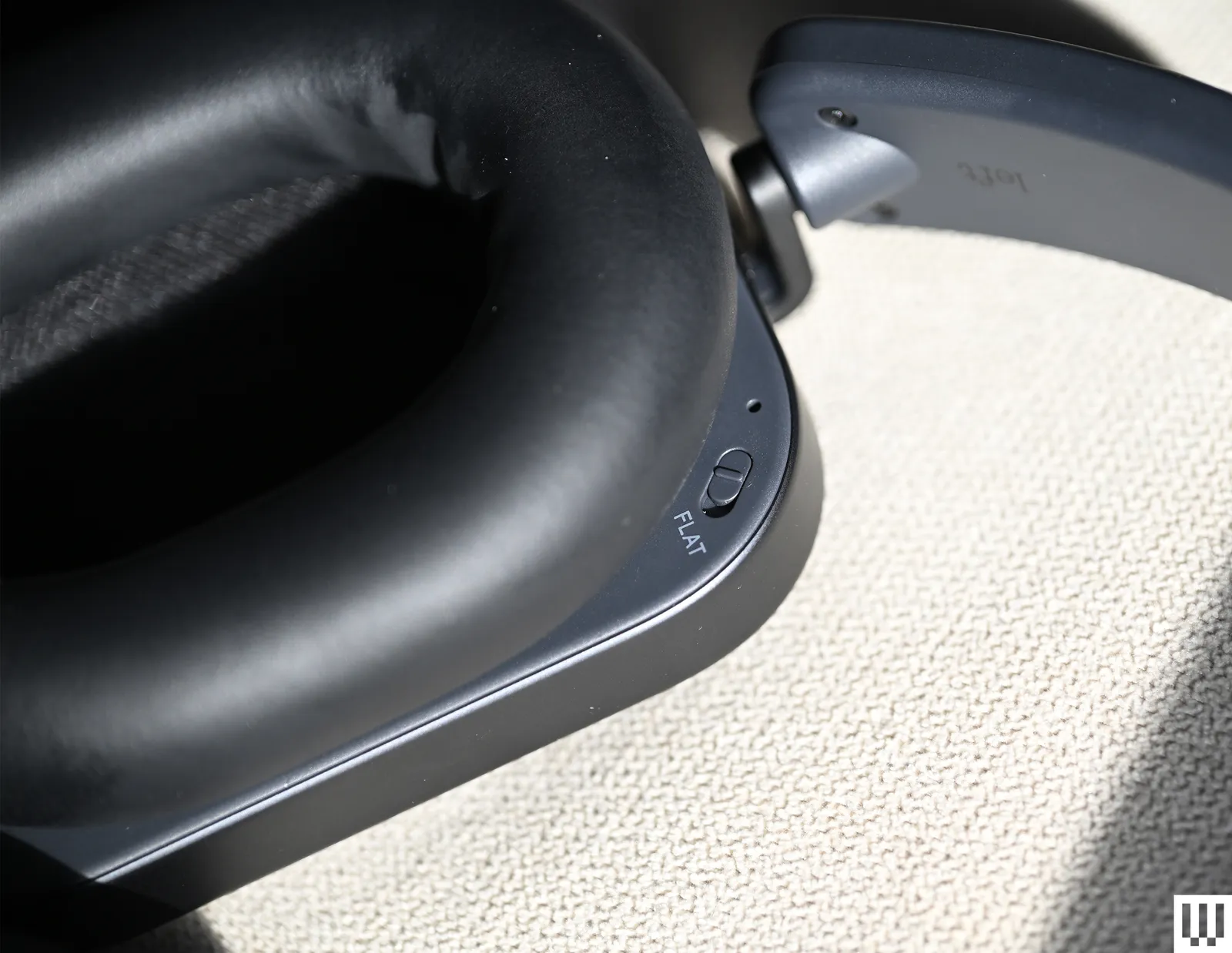 Image may contain Electronics Home Decor Cushion Car Transportation Vehicle and Headphones