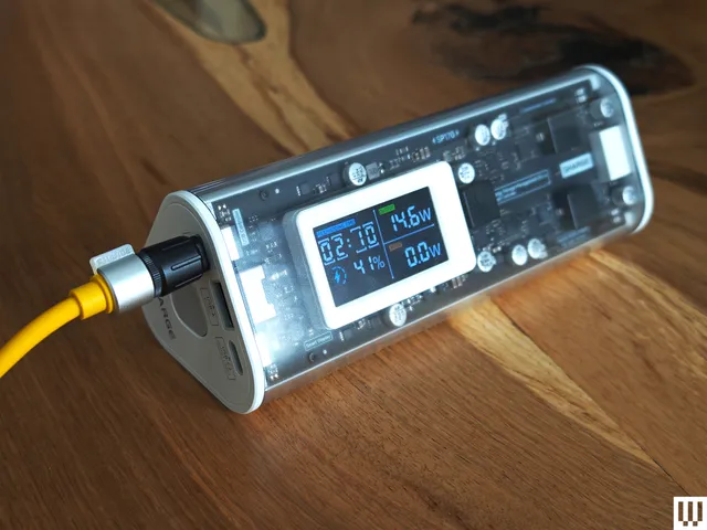 The Shargeek 170 is a long tube-shaped device with clear case that shows the internal pieces and has an external facing screen.
