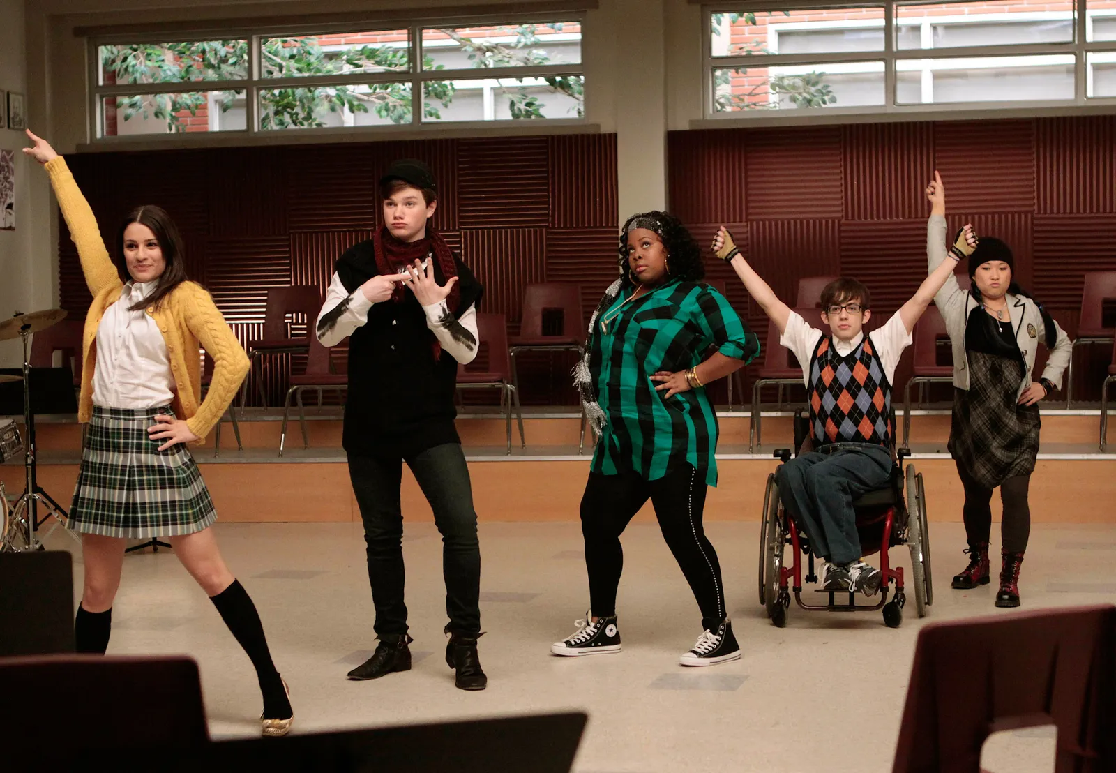 Image may contain Chris Colfer Amber Riley David Karp Clothing Footwear Shoe Adult Person Teen and Furniture