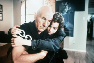 SAFE HOUSE, (from left): Patrick Stewart, Kimberly Williams, 1998. © Showtime / Courtesy: Everett Collection