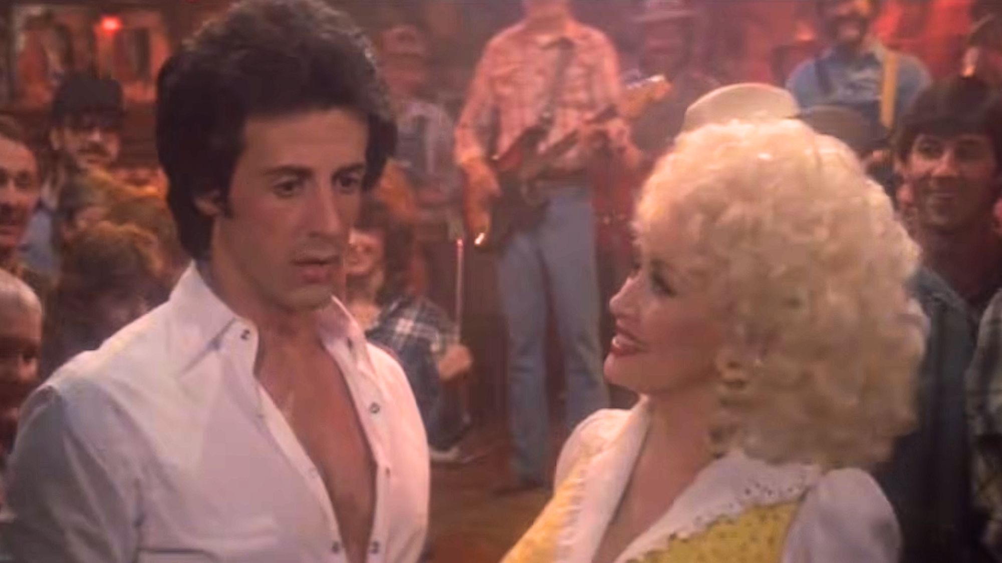 Dolly Parton and Sylvester Stallone in Rhinestone.