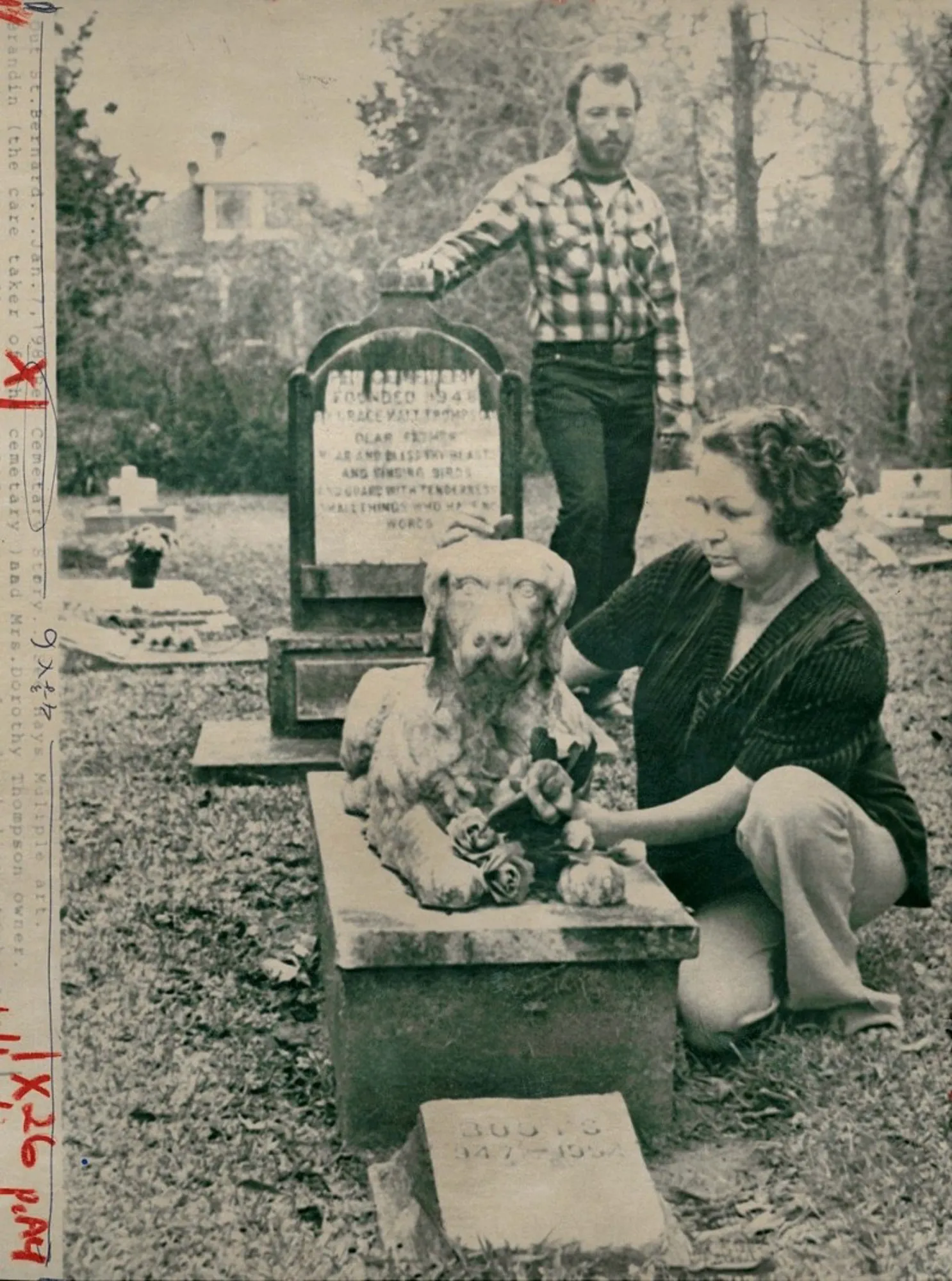 Image may contain Face Head Person Photography Portrait Adult Tomb Gravestone Clothing Pants Animal and Canine