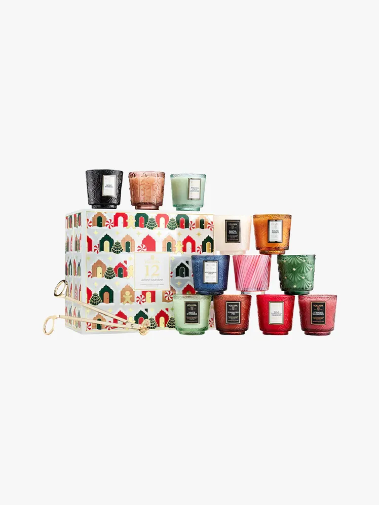 Voluspa Holiday Advent Calendar Gift Set in multiple branded components on a light gray background