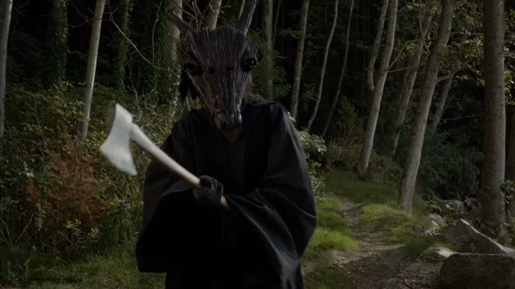 A masked killer holds an axe in Dead of Summer