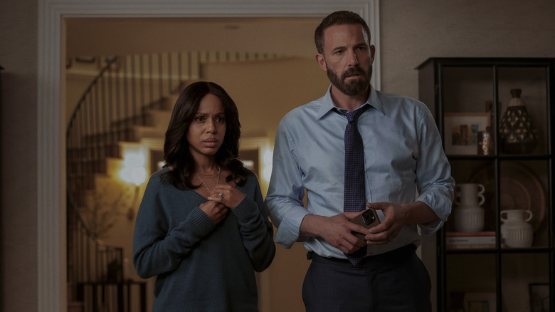 Kerry Washington's Abigail Kimball stands beside Ben Affleck's Mark Kimball in Animals