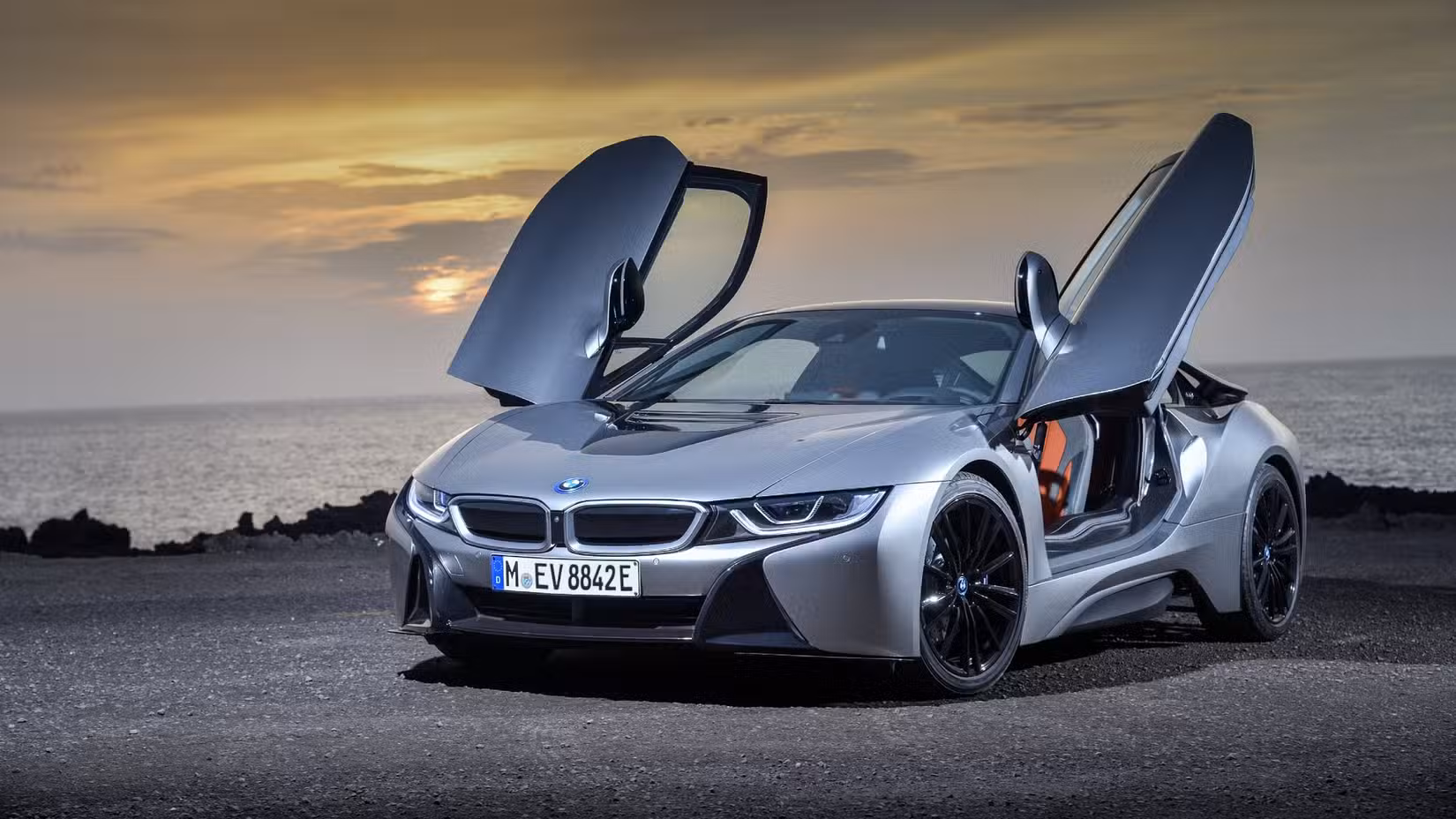 Static shot of the 2017 BMW i8 Coupe with sunset in the background