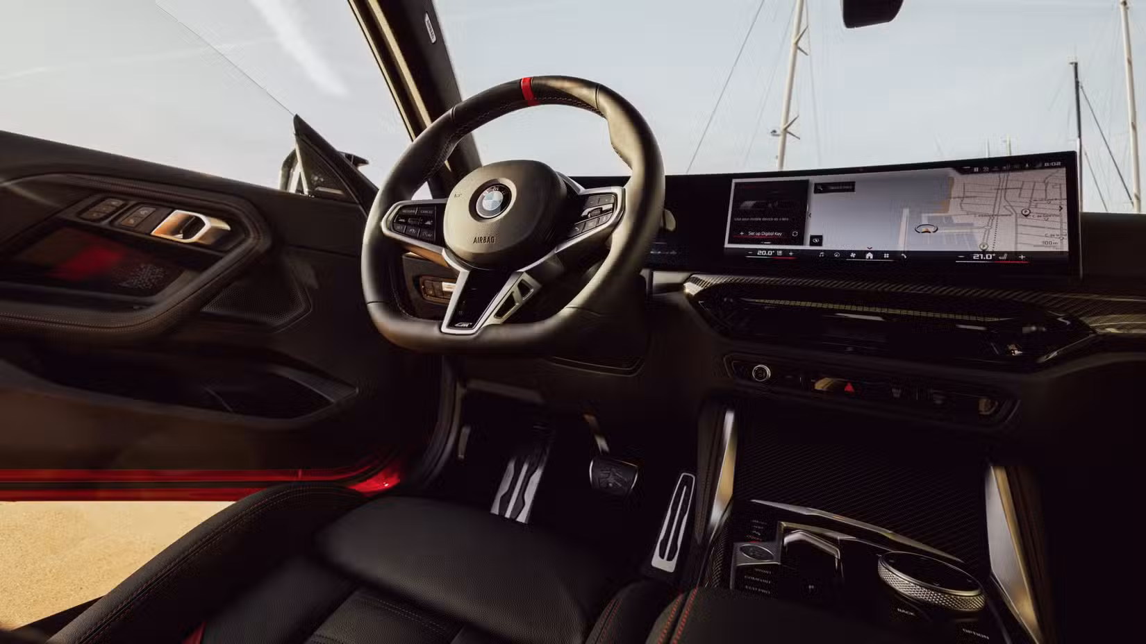 A detailed wide-angle shot of the BMW M240 xDrive's interior
