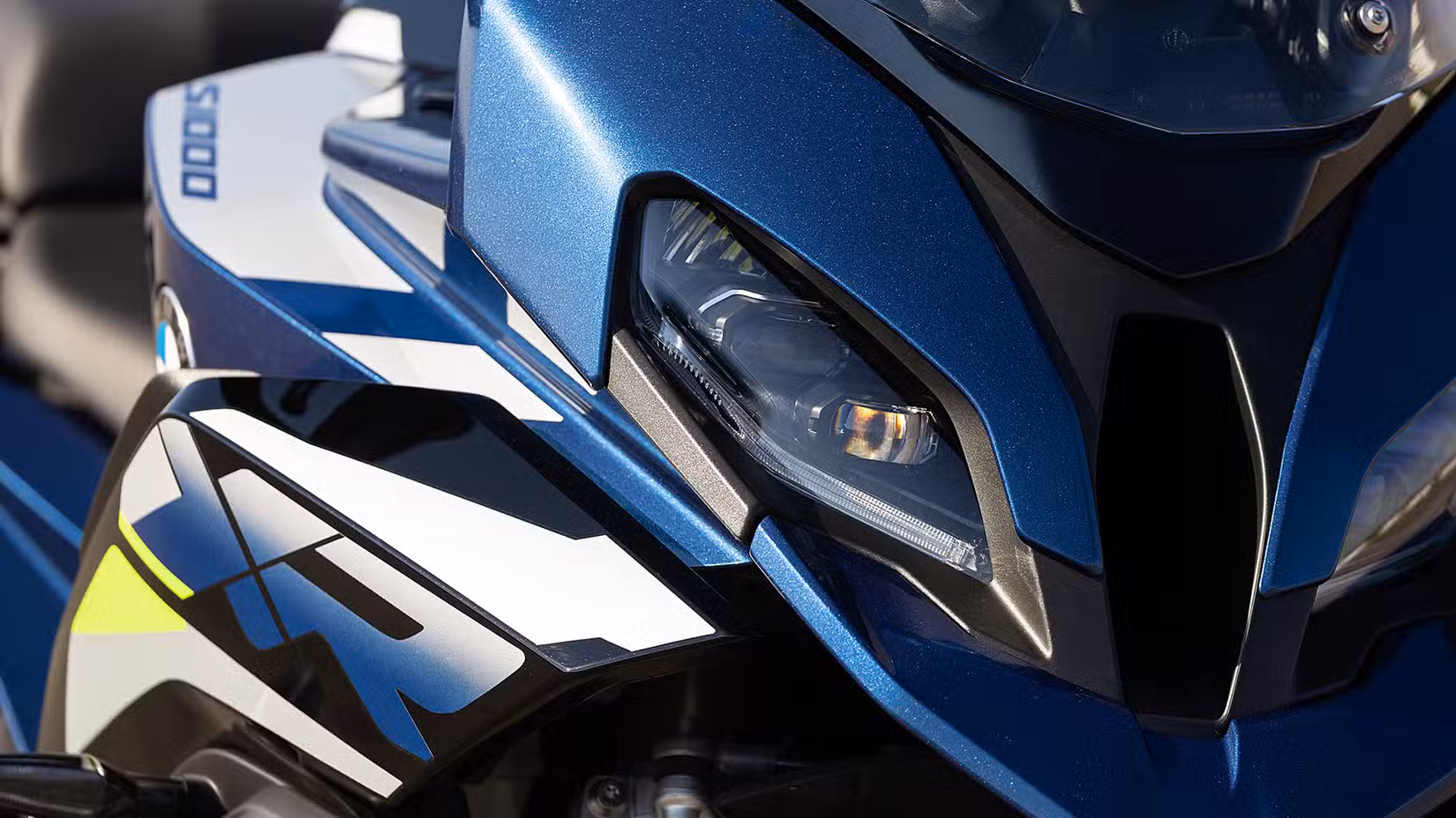 Close-up shot of BMW S 1000 XR headlamp