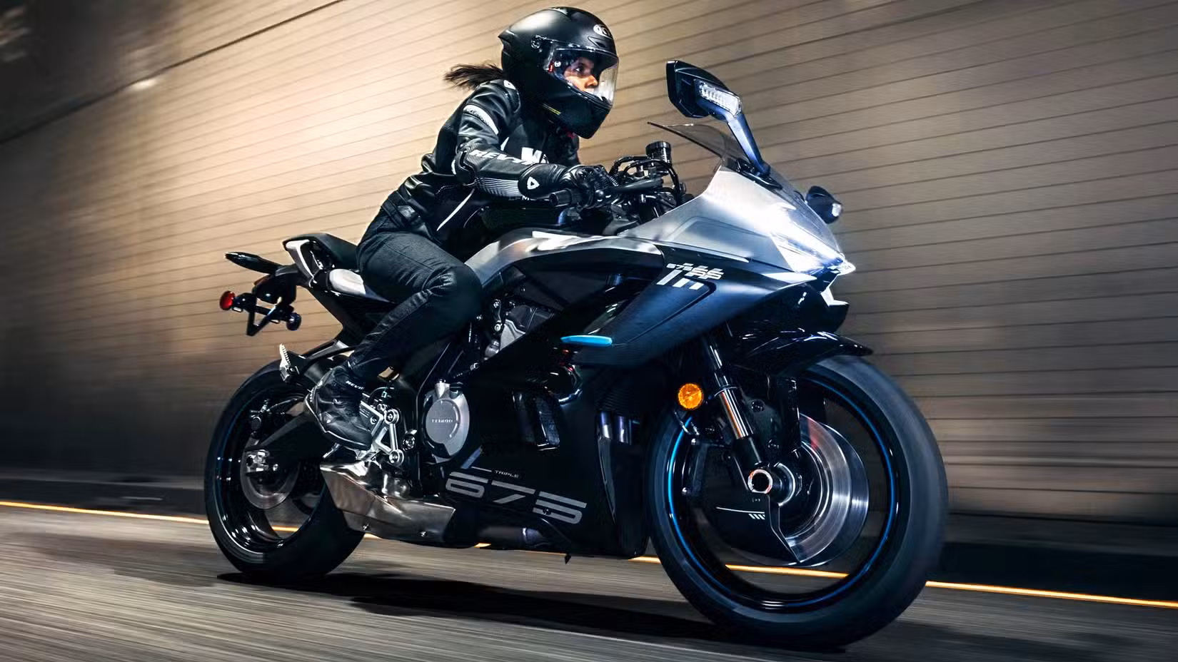 CFMoto 675SS being ridden in a tunnel at night