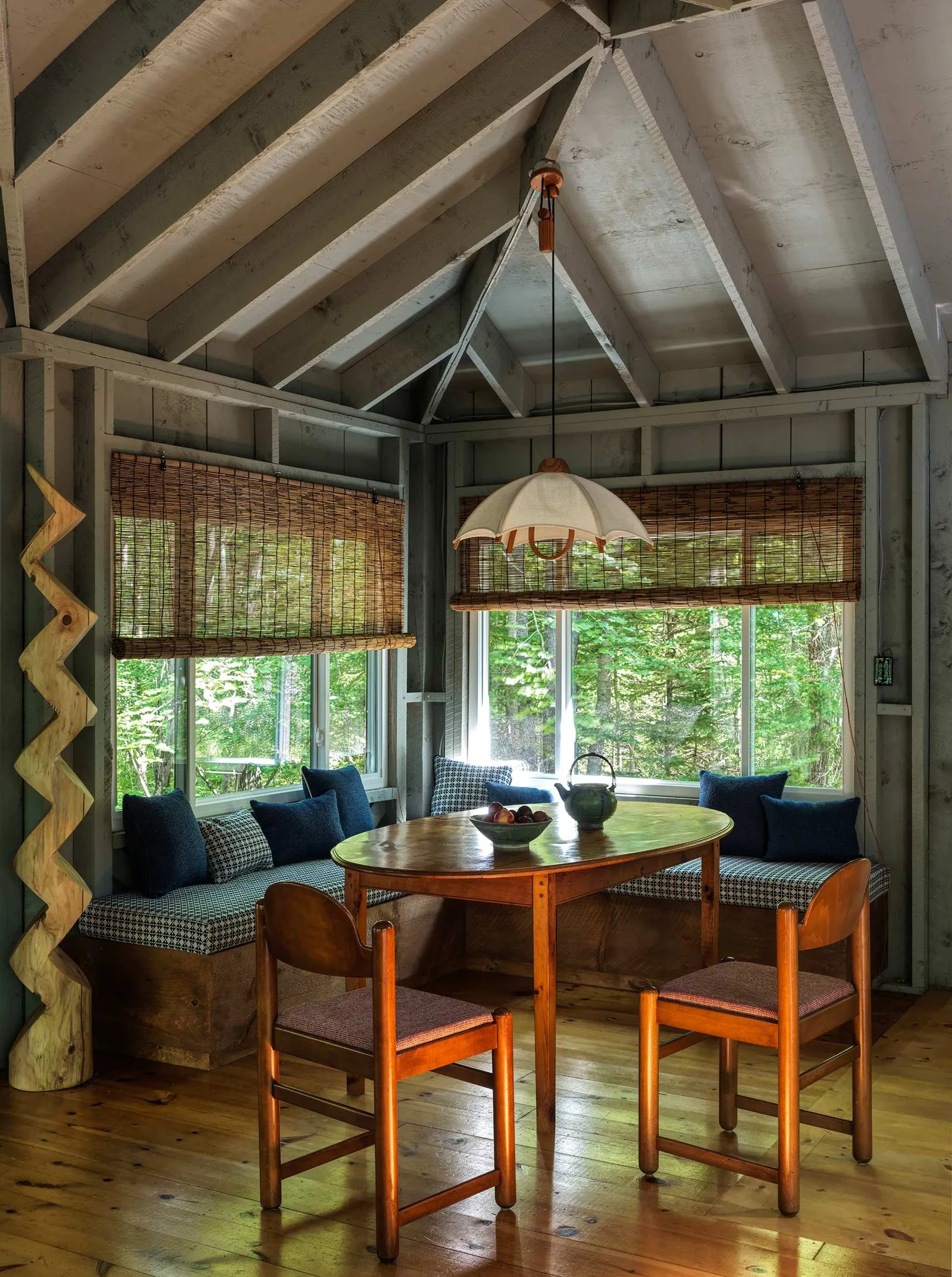 Image may contain Indoors Interior Design Chair Furniture Table Lamp Window Wood Hardwood and Stained Wood