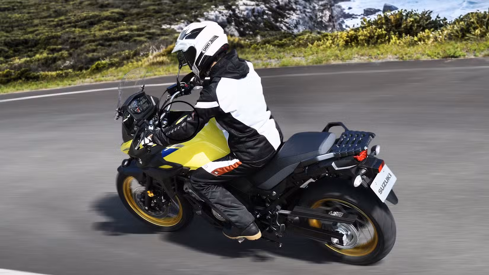 Suzuki V-Strom 650 XT cornering rear third quarter view