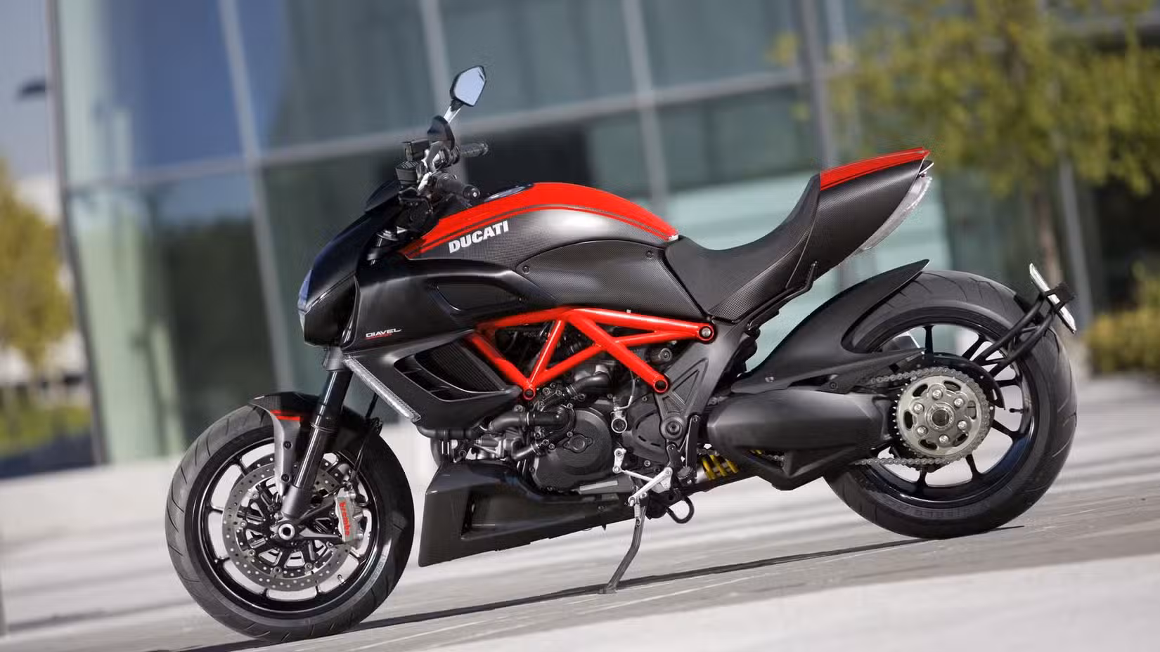 Static shot of 2011 Ducati Diavel parked outside a building