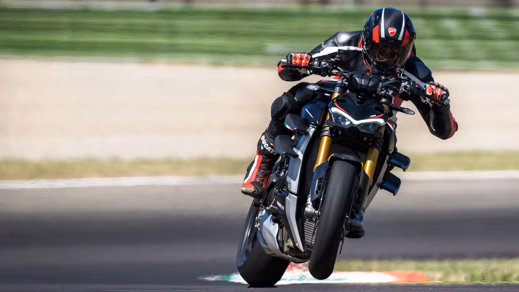 Ducati Streetfighter V4 SP exiting a corner on track