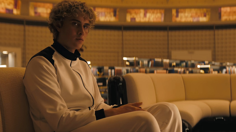 Haymitch sitting in a nice room in The Hunger Games: Sunrise on the Reaping