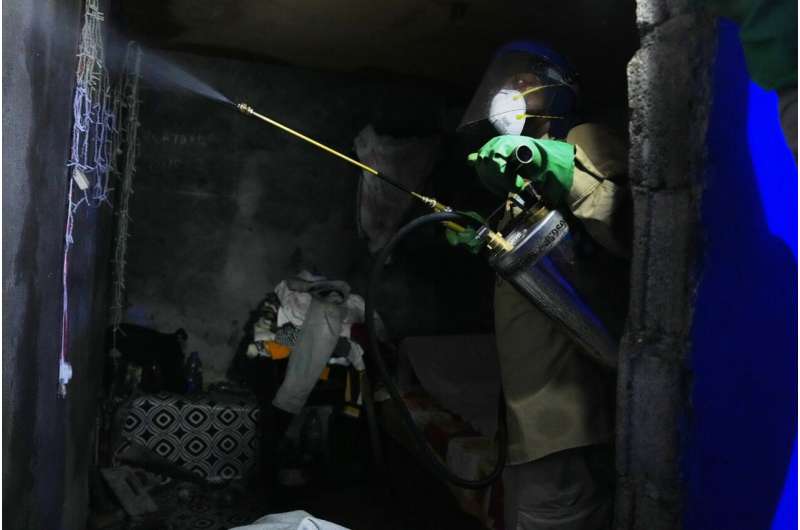 A worker sprays insecticide to help prevent the spread of malaria in Malabo, Equatorial Guinea, April 24, 2026. Credit: AP Photo/Misper Apawu Equatorial Guinea Malaria
