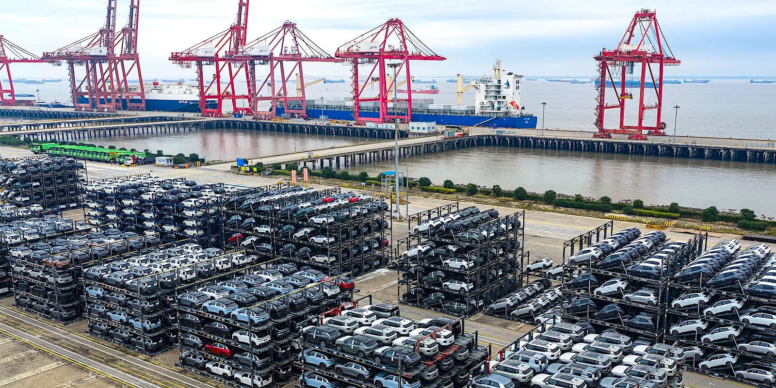 Used Chinese EVs at port, on their way to Europe and Canada at 40% off