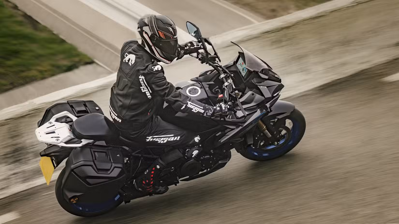 2026 Suzuki GSX-S1000GX+ leaning into a corner