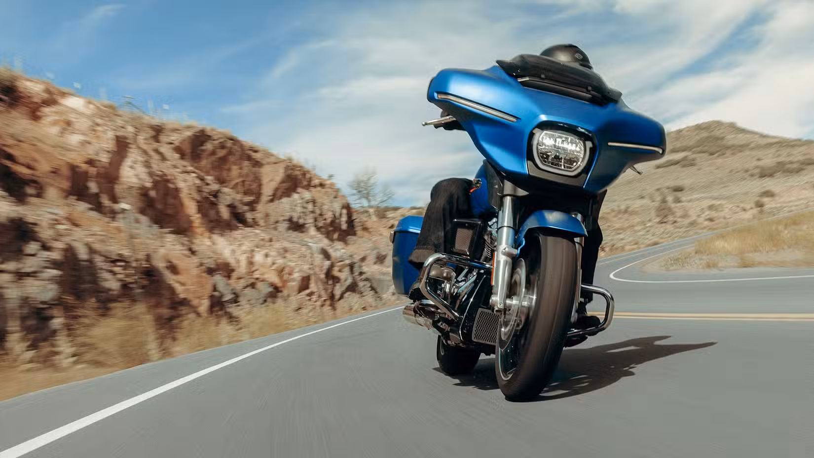 Riding shot of a Harley-Davidson Street Glide on a canyon road