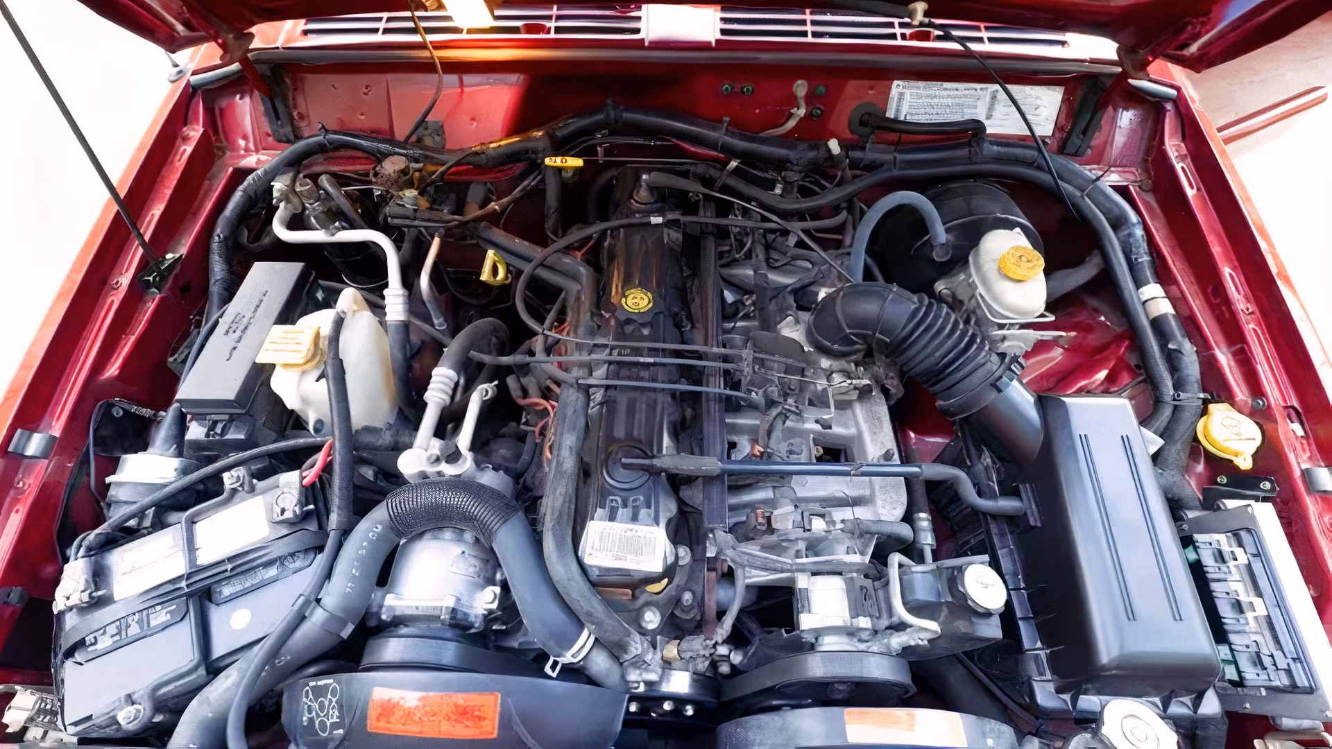 1998 Jeep Cherokee Sport (XJ) engine bay close-up