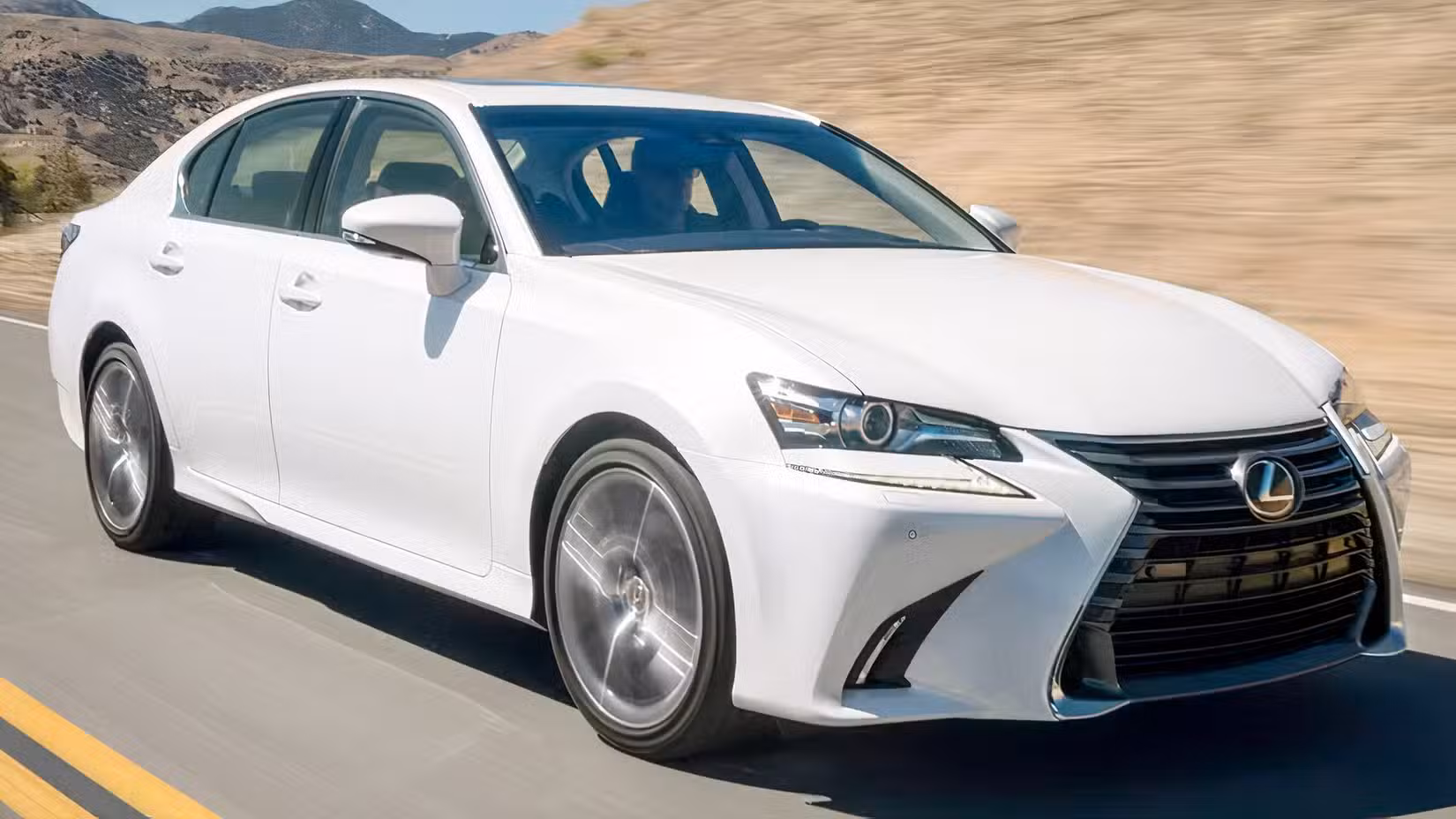 Front 3/4 action shot of 2020 Lexus GS 350 driving
