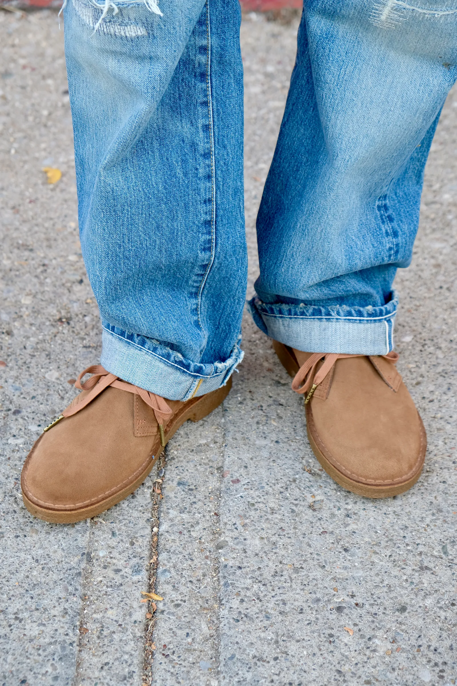 Image may contain Clothing Pants Jeans Footwear Shoe and Sneaker