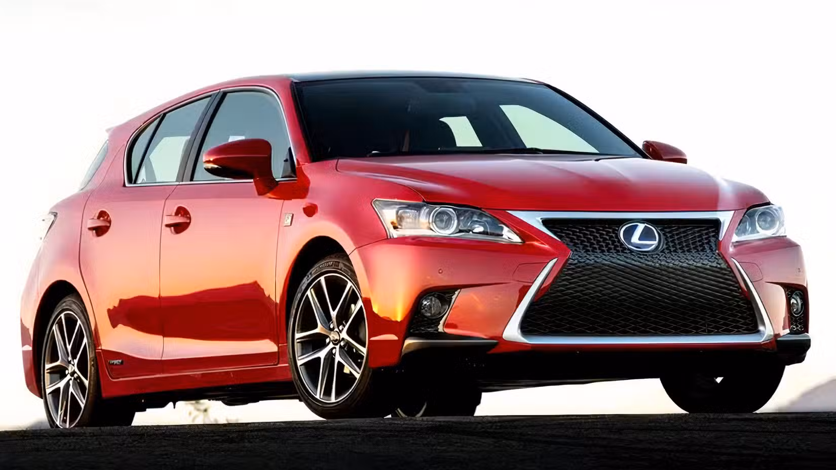 Low-angle front 3.4 shot of 2015 Lexus CT 200h (Hybrid) In red