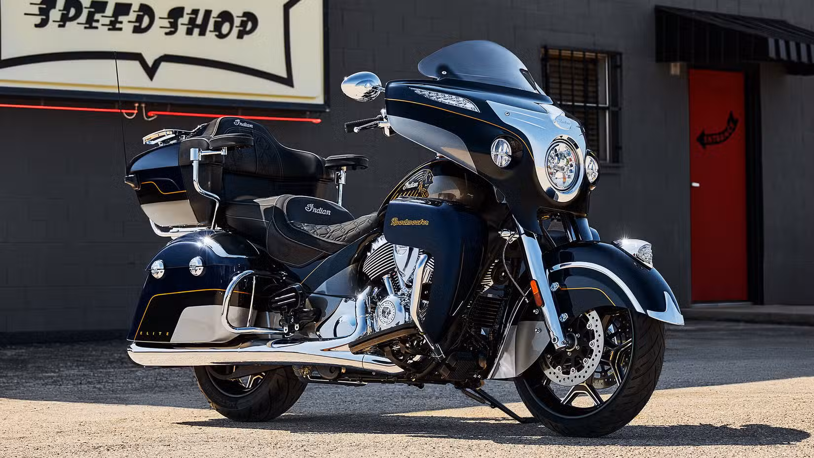Indian Roadmaster Elite parked outside a custom shop