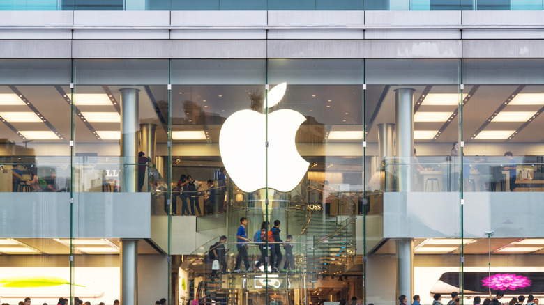 Customers seen walking in an Apple store in Hong Kong.