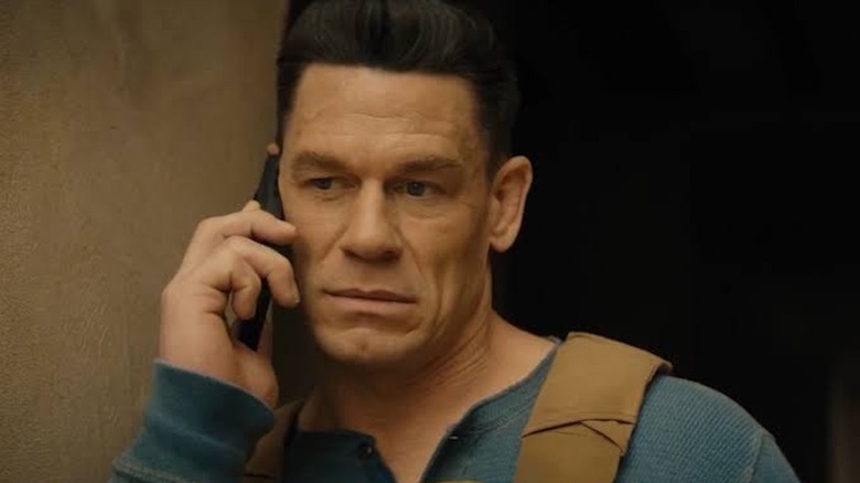 Jon Cena takes a phone call as Sean Walker in Matchbox: The Movie