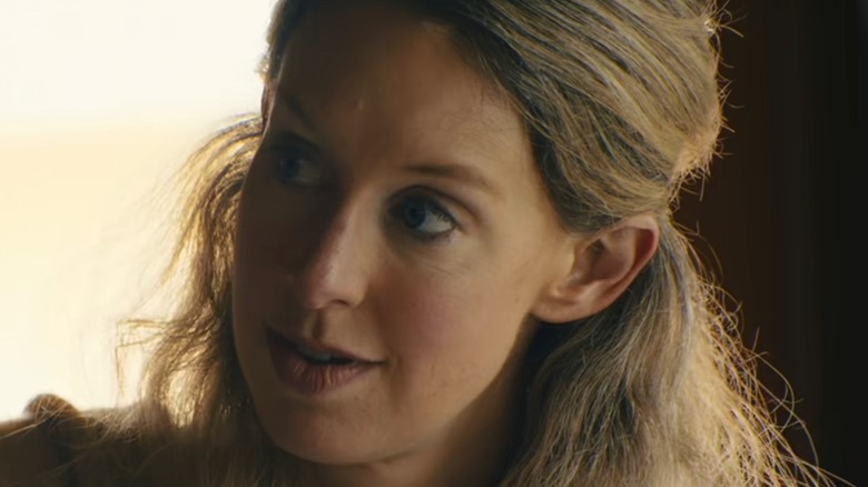 Elizabeth Holmes looking to the side in You Can See Everything