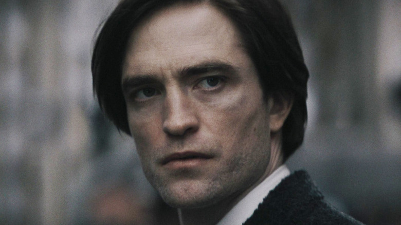 Robert Pattinson's Bruce Wayne is seen in closeup in The Batman