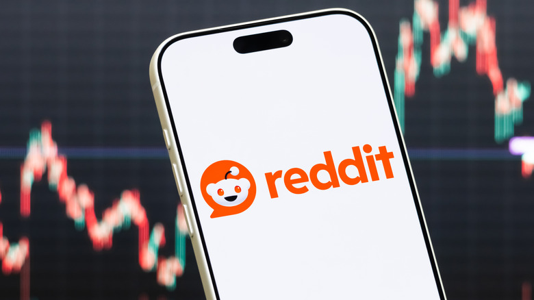 The reddit logo on a phone.
