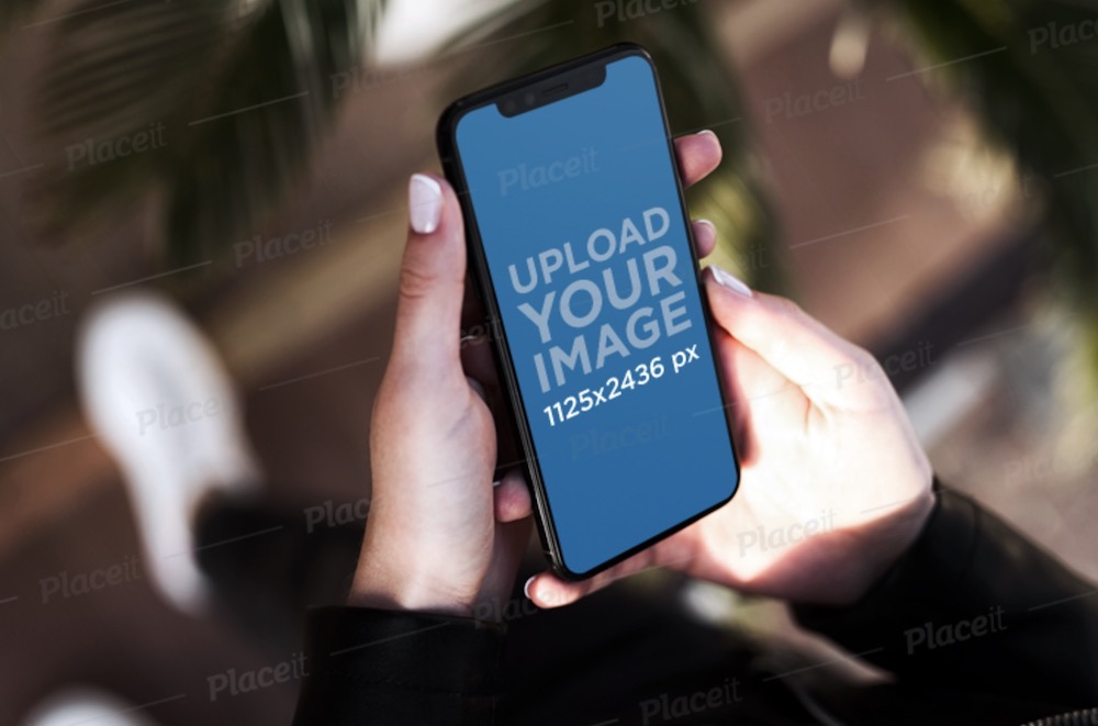 iphone 11 pro mockup featuring a woman holding her phone