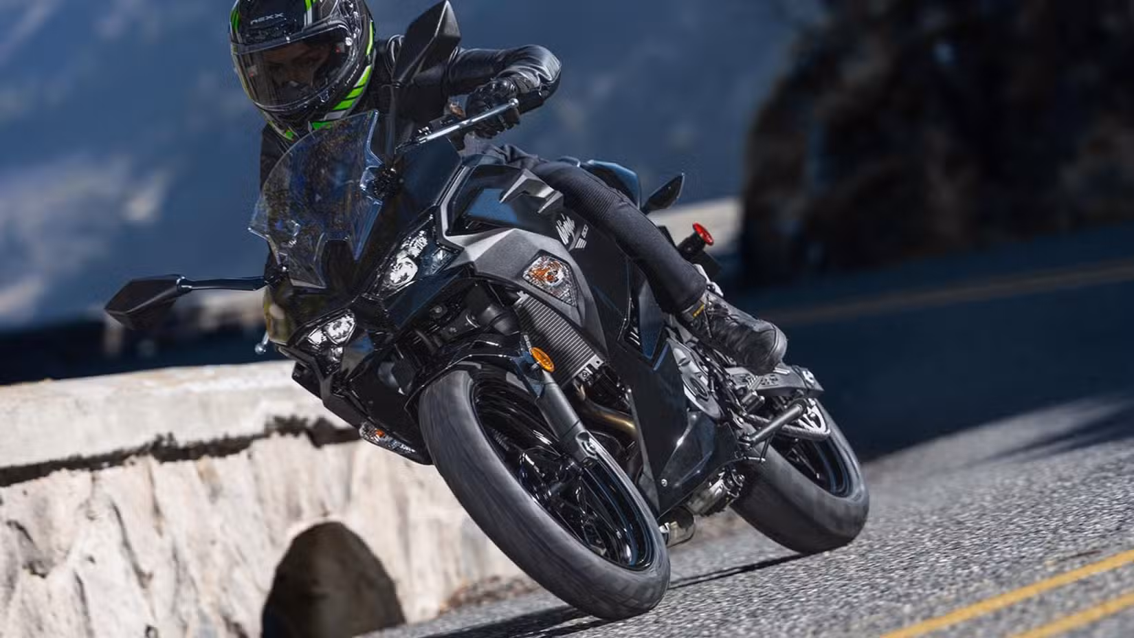 2026 Kawasaki Ninja 500 leaning into a corner
