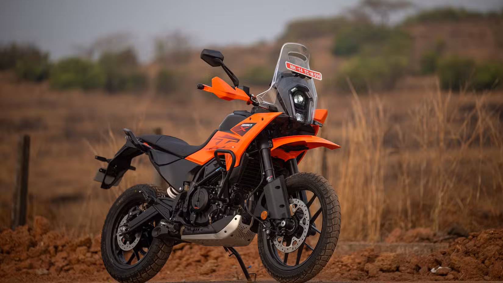 KTM 390 Adventure X on an off-roading patch static cinematic shot