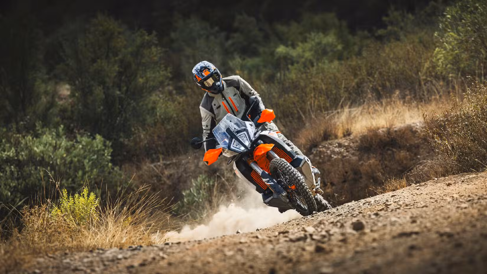Front shot of a KTM 890 Adventure R sliding in gravel