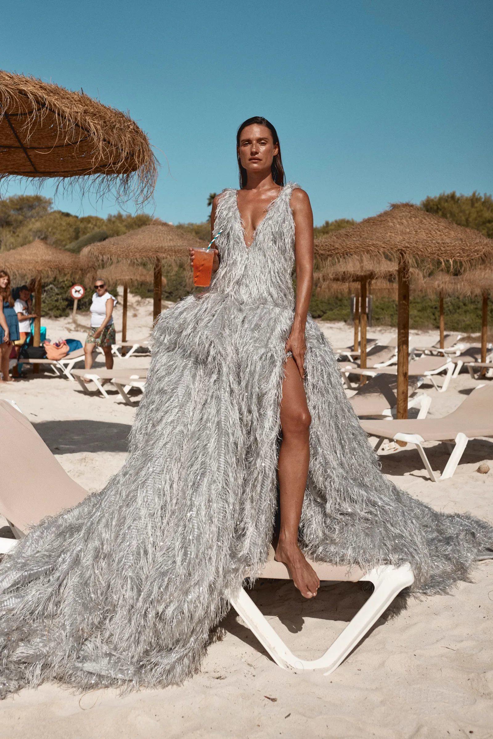 Image may contain Michelle Hunziker Beachwear Clothing Person Adult Wedding and Shorts