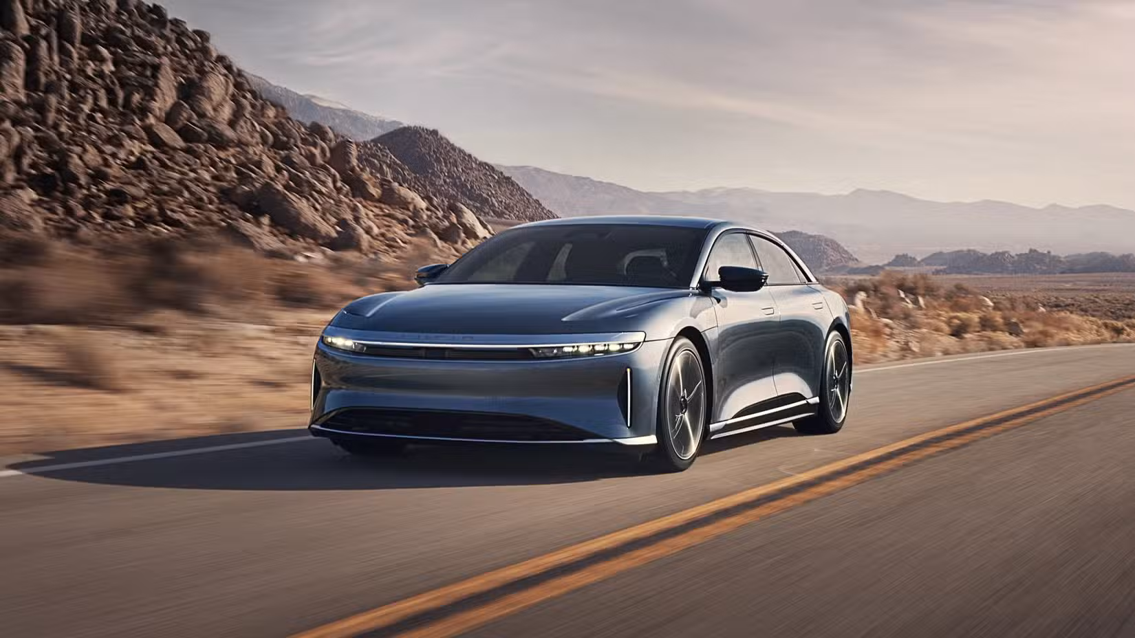 Silver Lucid Air Pure front-quarter tracking