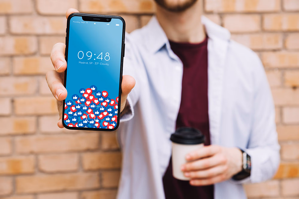 man holding iphone x mockup