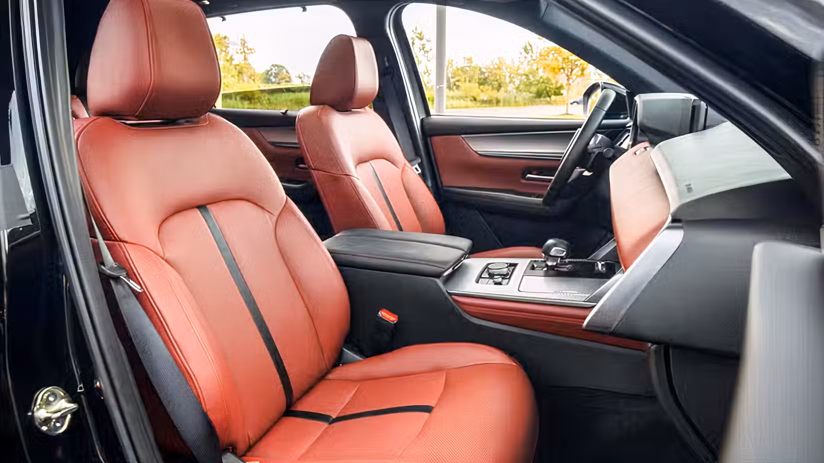 Interior shot of a Mazda CX-70 with Red Leather Front Seats
