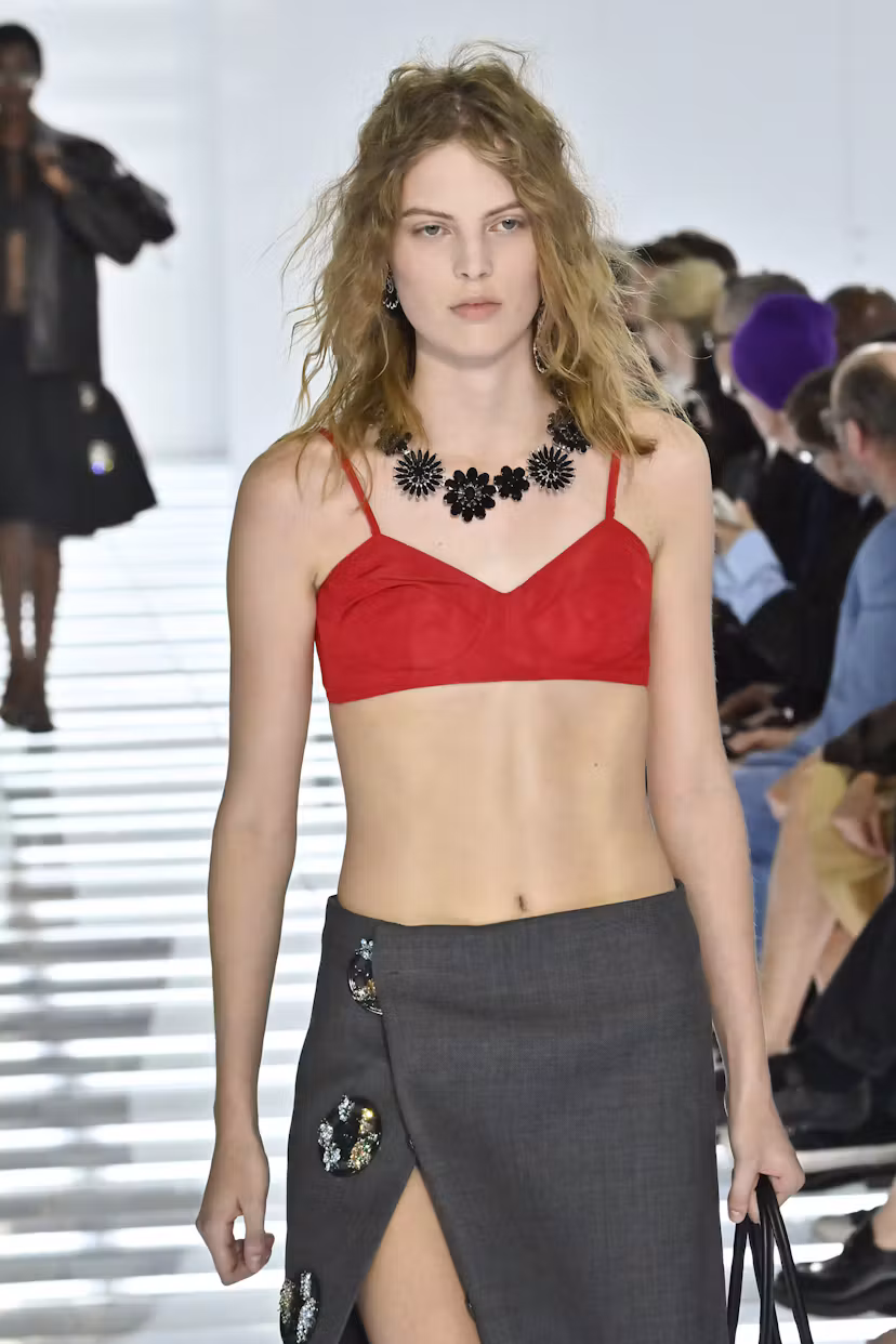 MILAN, ITALY - SEPTEMBER 22: A model walks the runway at the Prada fashion show during the Milan Fas...